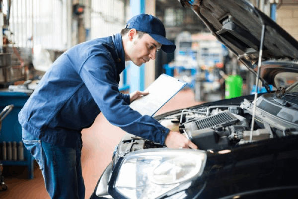 mechanic repairing a car - financial forecast for an auto repair shop