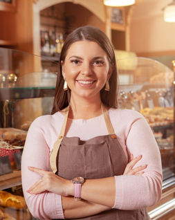 bakery owner using our business plan template