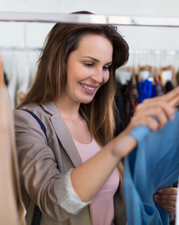 clothes shop owner using our business plan template