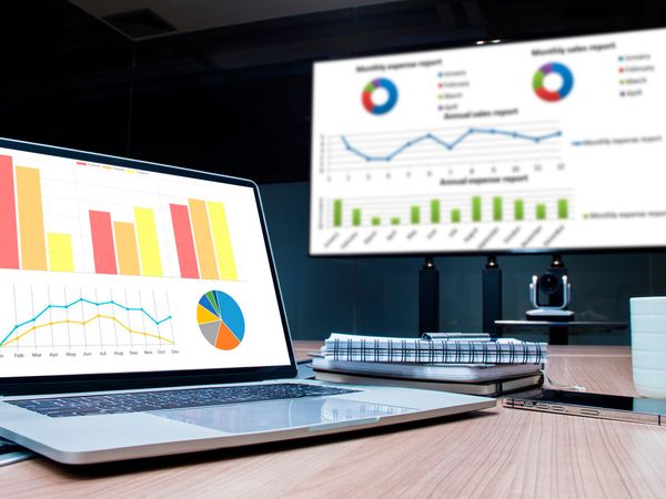 pitch deck financials slide being presented in a business meeting