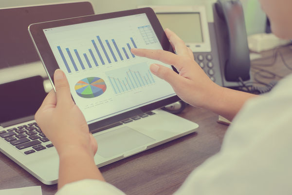 entrepreneur discussing how their pricing strategy affects their sales forecast in their business plan